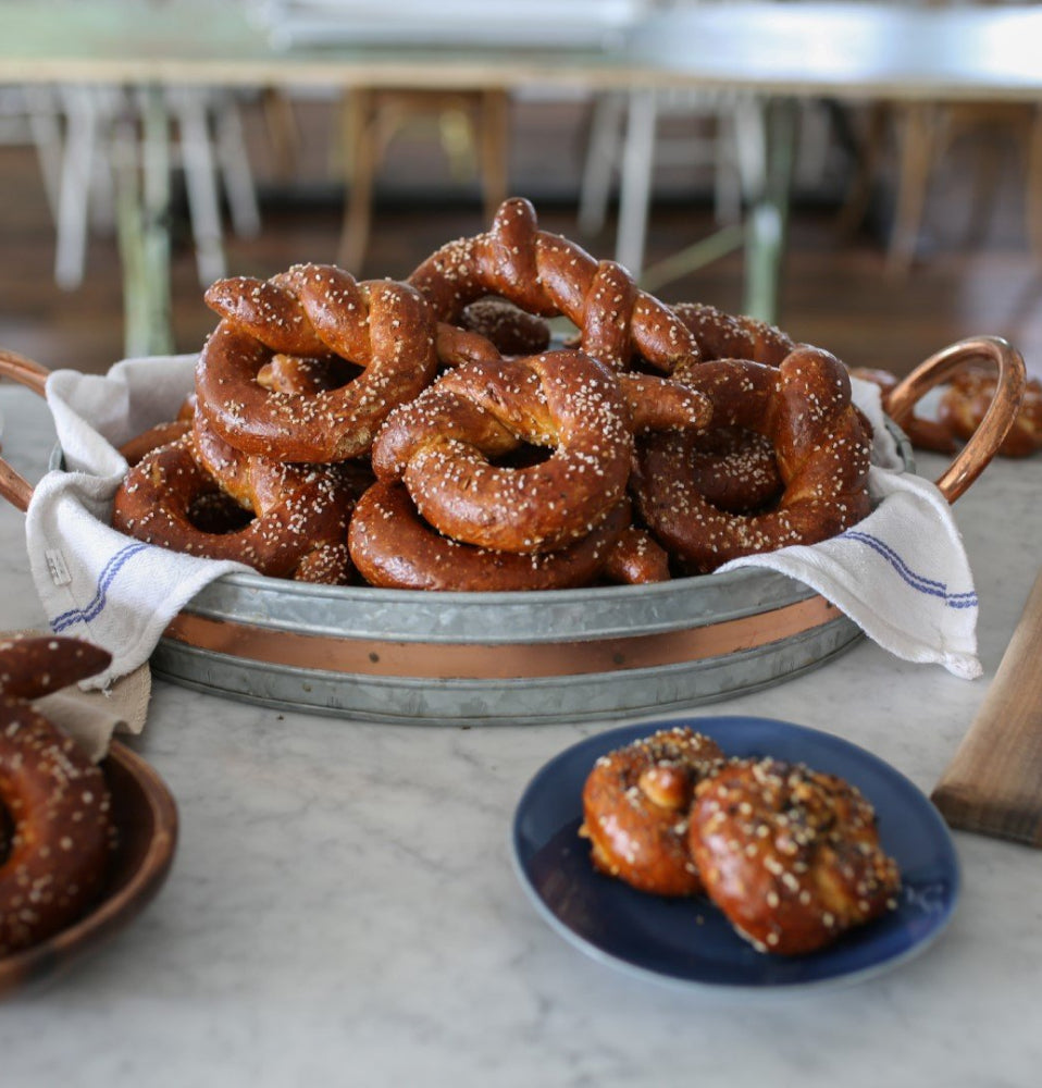 Table with plates filled with pretzels